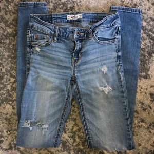 Light blue ripped jeans